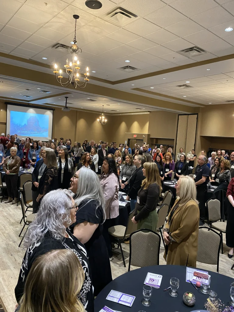 Large crowd standing in a ballroom during the 2025 MVAN Women in Business Awards luncheon, celebrating women’s leadership and community impact